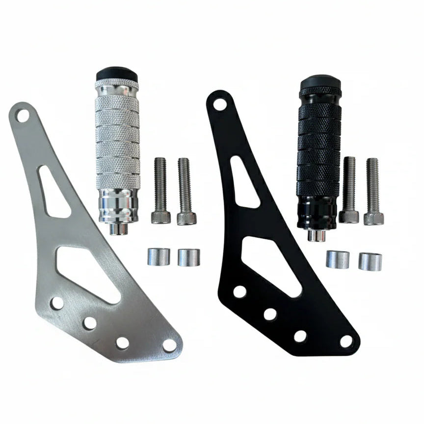 Mechanical parts including metal brackets and cylindrical components on a white background